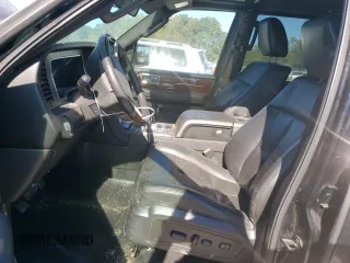 2011 Lincoln Navigator z VIN 5LMJJ2H55BEJ09162, wystawiony jako Copart lot #74710464 z przebiegiem 240 501 mil mil oraz Szkoda całkowita • Salvage title. Historia ofert i sprzedaży dostępna na DreamBid. Obrazek 7.