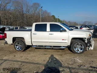 2015 Chevrolet Silverado 1500 LT with VIN 3GCUKREHXFG460818, listed as a IAAI auction lot 41491758 with 211,704 mi miles. Bid and sale history available at carsss.com. Image 13.