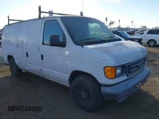 2006 Ford Econoline Cargo with VIN 1FTRE14W36DA96964, listed as a IAAI auction lot 41139403 with 252,807 mi miles and . Bid and sale history available at DreamBid. Image 1.