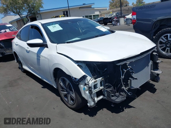 2020 Honda Civic LX with VIN 2HGFC2F67LH511473, listed as a IAAI auction lot 42614633 with 91,822 mi miles and . Bid and sale history available at DreamBid. Image 1.