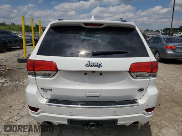 2017 Jeep Grand Cherokee Overland with VIN 1C4RJFCGXHC823593, listed as a Copart auction lot 58727205 with Not provided miles and Salvage title. Bid and sale history available at DreamBid. Image 6.