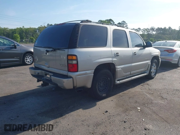 2004 GMC Yukon Denali z VIN 1GKEK63U94J249578, wystawiony jako IAAI lot #42088940 z przebiegiem 253 352 mil mil oraz . Historia ofert i sprzedaży dostępna na DreamBid. Obrazek 4.