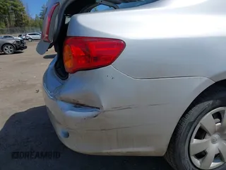 2010 Toyota Corolla with VIN 2T1BU4EEXAC298637, listed as a IAAI auction lot 42036415 with 103,885 mi miles. Bid and sale history available at carsss.com. Image 16.