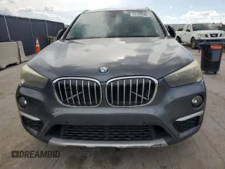 2017 BMW X1 xDrive28i with VIN WBXHT3C32H5F75870, listed as a Copart auction lot 64420385 with 158,640 mi miles and Clean title. Bid and sale history available at DreamBid. Image 5.