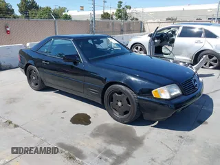 1996 Mercedes-Benz SL 500 with VIN WDBFA67F0TF130803, listed as a IAAI auction lot 42607408 with 155,084 mi miles and . Bid and sale history available at DreamBid. Image 1.