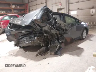 2014 Toyota Prius Two with VIN JTDZN3EUXEJ009120, listed as a IAAI auction lot 41951922 with 158,764 mi miles and . Bid and sale history available at DreamBid. Image 4.