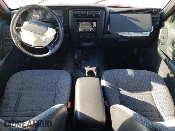 2000 Jeep Cherokee with VIN 1J4FF48S7YL237109, listed as a Copart auction lot 58420385 with 191,786 mi miles and Non repairable. Bid and sale history available at DreamBid. Image 8.