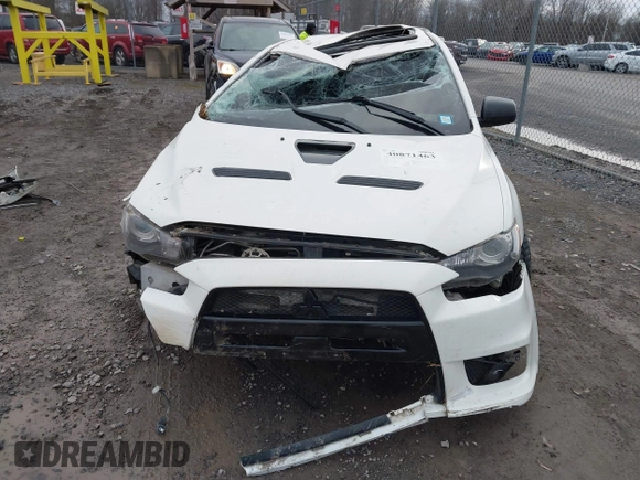 2014 Mitsubishi Lancer Evolution GSR with VIN JA32W8FV5EU012572, listed as a IAAI auction lot 40871463 with 89,529 mi miles. Bid and sale history available at carsss.com. Image 13.