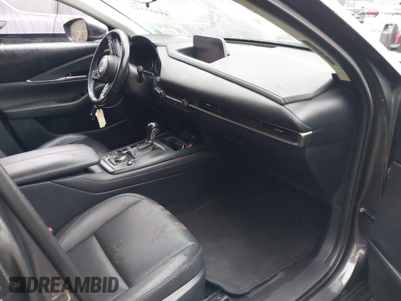 2021 Mazda CX-30 Select with VIN 3MVDMBBL2MM312752, listed as a IAAI auction lot 41933342 with 52,213 mi miles and . Bid and sale history available at DreamBid. Image 5.