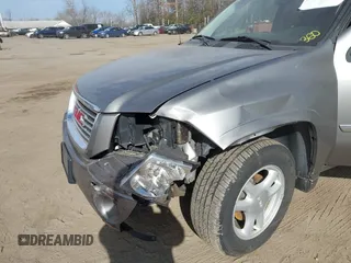 2008 GMC Envoy SLE2 with VIN 1GKDT13S782210241, listed as a IAAI auction lot 41635443 with 171,816 mi miles. Bid and sale history available at carsss.com. Image 6.