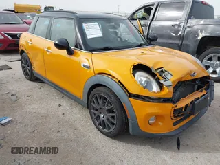 2016 MINI Hardtop 4 Door z VIN WMWXU1C56G2D10006, wystawiony jako IAAI lot #41752731 z przebiegiem 67 844 mil mil oraz . Historia ofert i sprzedaży dostępna na DreamBid. Obrazek 6.
