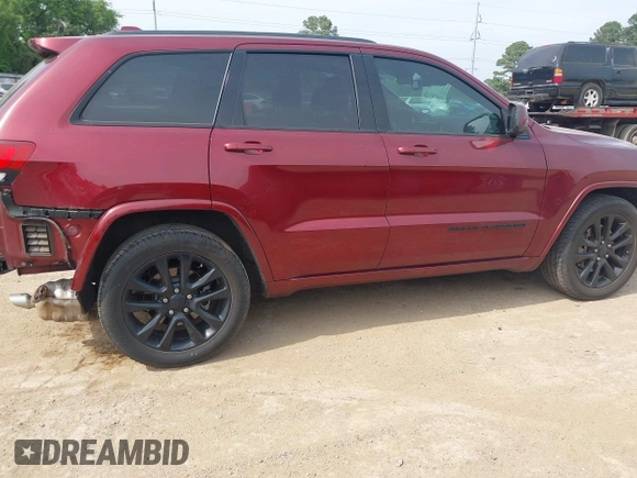 2021 Jeep Grand Cherokee Laredo X with VIN 1C4RJEAG0MC539722, listed as a IAAI auction lot 42059140 with 63,582 mi miles and . Bid and sale history available at DreamBid. Image 13.