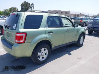 2009 Ford Escape Hybrid z VIN 1FMCU49329KA08605, wystawiony jako IAAI lot #42367265 z przebiegiem 166 562 mil mil oraz . Historia ofert i sprzedaży dostępna na DreamBid. Obrazek 4.