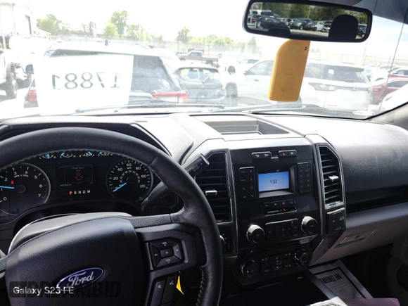 2018 Ford F-150 XL with VIN 1FTEW1E57JKF37999, listed as a IAAI auction lot 42240766 with 159,287 mi miles and . Bid and sale history available at carsss.com. Image 1.