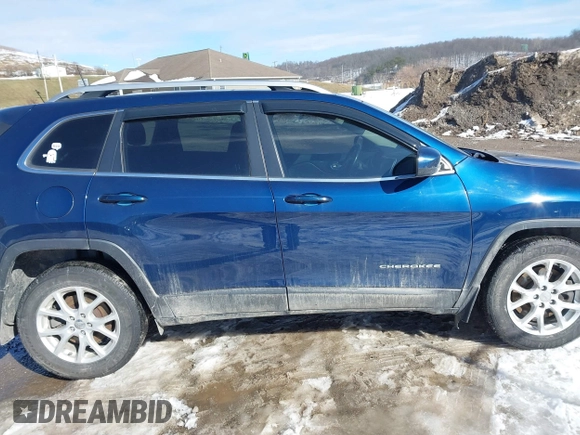 2018 Jeep Cherokee Latitude Plus with VIN 1C4PJMLX0JD529969, listed as a IAAI auction lot 41412343 with 98,506 mi miles. Bid and sale history available at carsss.com. Image 13.