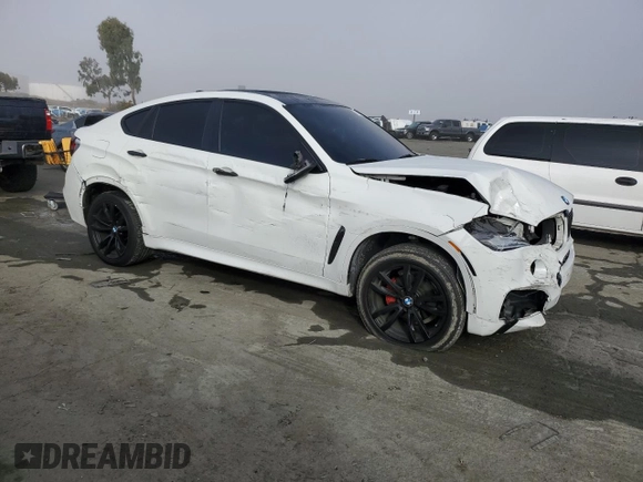 2015 BMW X6 sDrive35i with VIN 5UXKU0C58F0F92066, listed as a Copart auction lot 80597874 with 117,476 mi miles and Salvage Title. Bid and sale history available at carsss.com. Image 4.