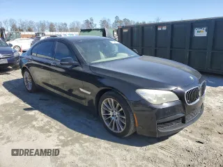 2013 BMW 7 Series 750Li with VIN WBAYE8C53DD132823, listed as a Copart auction lot 46090795 with 199,977 mi miles and Salvage title. Bid and sale history available at DreamBid. Image 4.