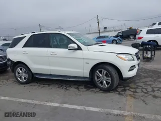 2012 Mercedes-Benz M-Class ML 350 with VIN 4JGDA5HB4CA020117, listed as a IAAI auction lot 41861596 with 113,677 mi miles. Bid and sale history available at carsss.com. Image 14.