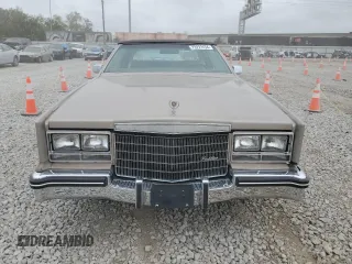 1985 Cadillac Eldorado z VIN 1G6EL5788FE655155, wystawiony jako Copart lot #73223134 z przebiegiem 68 676 mil mil oraz Tytuł czysty. Historia ofert i sprzedaży dostępna na DreamBid. Obrazek 5.