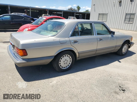 1990 Mercedes-Benz 300 with VIN WDBCA24D1LA529716, listed as a Copart auction lot 56581335 with 122,286 mi miles and Salvage Title. Bid and sale history available at DreamBid. Image 3.