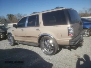 1997 Ford Expedition XLT with VIN 1FMEU1769VLC38411, listed as a Copart auction lot 50315135 with 230,863 mi miles and Salvage title. Bid and sale history available at DreamBid. Image 2.