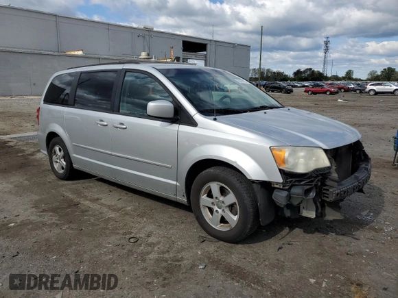 2012 Dodge Grand Caravan SXT with VIN 2C4RDGCG5CR327937, listed as a Copart auction lot 52905955 with 168,382 mi miles and Salvage Title. Bid and sale history available at DreamBid. Image 4.