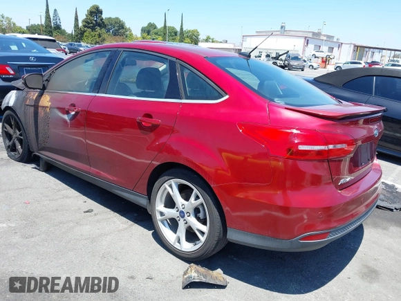 2016 Ford Focus Titanium with VIN 1FADP3J28GL362154, listed as a IAAI auction lot 42624259 with 15,000 mi miles and . Bid and sale history available at DreamBid. Image 3.
