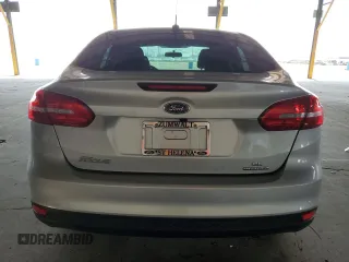 2015 Ford Focus SE with VIN 1FADP3F20FL232196, listed as a Copart auction lot 64829835 with 31,294 mi miles and Salvage title. Bid and sale history available at DreamBid. Image 6.