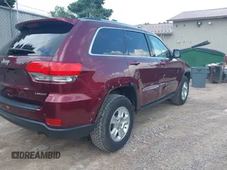2016 Jeep Grand Cherokee Laredo with VIN 1C4RJFAG8GC318878, listed as a IAAI auction lot 42600747 with 85,882 mi miles and . Bid and sale history available at DreamBid. Image 4.
