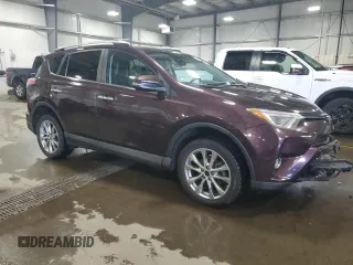 2016 Toyota RAV4 Limited with VIN 2T3DFREV3GW537010, listed as a Copart auction lot 52183005 with 133,558 mi miles and Salvage title. Bid and sale history available at DreamBid. Image 4.