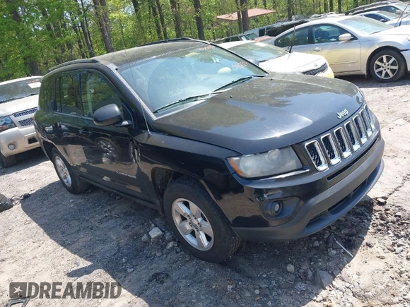 2014 Jeep Compass Sport with VIN 1C4NJCBA0ED511217, listed as a IAAI auction lot 42008976 with 210,780 mi miles. Bid and sale history available at carsss.com. Image 1.