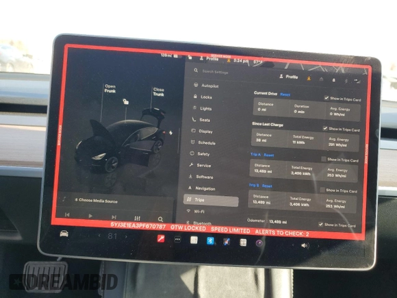 2023 Tesla Model 3 with VIN 5YJ3E1EA3PF670787, listed as a Copart auction lot 49070865 with 13,489 mi miles and Salvage title. Bid and sale history available at DreamBid. Image 9.