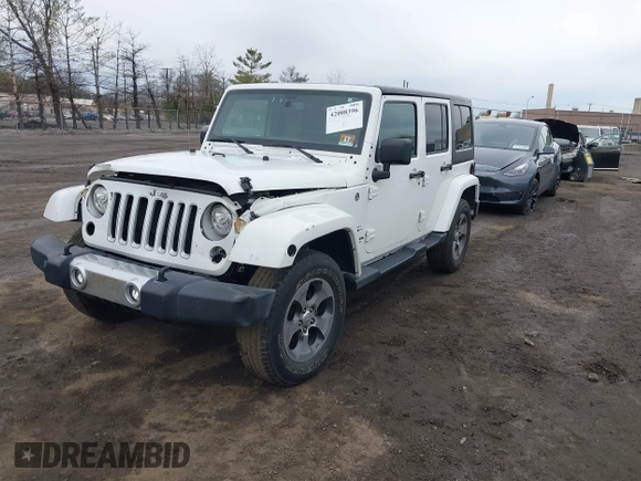 2017 Jeep Wrangler Unlimited Sahara z VIN 1C4BJWEG2HL695672, wystawiony jako IAAI lot #42008396 z przebiegiem 56 028 mil mil oraz . Historia ofert i sprzedaży dostępna na DreamBid. Obrazek 2.