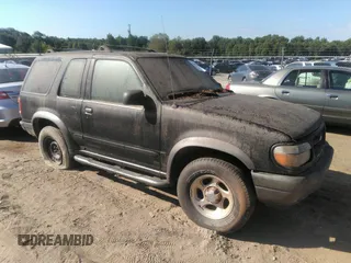 2000 Ford Explorer z VIN 1FMDU70E3YUB02516, wystawiony jako IAAI lot #42848390 z przebiegiem 183 280 mil mil oraz . Historia ofert i sprzedaży dostępna na DreamBid. Obrazek 1.