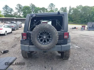 2012 Jeep Wrangler Unlimited Sport with VIN 1C4BJWDG8CL120308, listed as a IAAI auction lot 42365817 with 190,619 mi miles and . Bid and sale history available at DreamBid. Image 17.