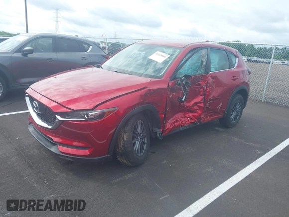 2019 Mazda CX-5 Sport with VIN JM3KFABM5K0627087, listed as a IAAI auction lot 42163866 with 38,050 mi miles and . Bid and sale history available at DreamBid. Image 17.