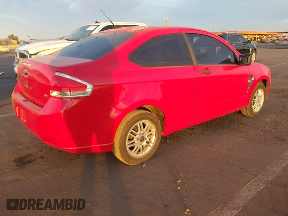2008 Ford Focus SE with VIN 1FAHP33N08W279388, listed as a IAAI auction lot 41186937 with 199,981 mi miles. Bid and sale history available at carsss.com. Image 4.