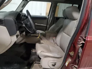 2007 Jeep Commander Limited with VIN 1J8HG582X7C553502, listed as a Copart auction lot 89201285 with 184,233 mi miles and Salvage title. Bid and sale history available at DreamBid. Image 7.