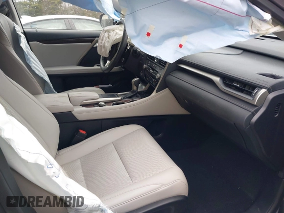 2021 Lexus RX with VIN 2T2HZMDA4MC259360, listed as a IAAI auction lot 41820519 with 57,747 mi miles. Bid and sale history available at carsss.com. Image 5.