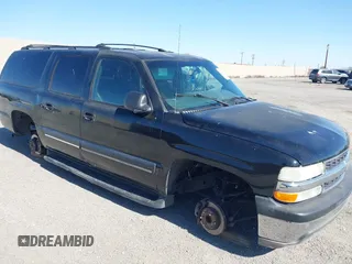 2002 Chevrolet Suburban LT z VIN 3GNEC16T72G251348, wystawiony jako IAAI lot #42171802 z przebiegiem 156 280 mil mil oraz . Historia ofert i sprzedaży dostępna na DreamBid. Obrazek 1.