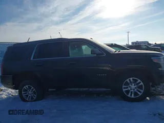 2020 Chevrolet Tahoe LT with VIN 1GNSKBKC9LR309818, listed as a IAAI auction lot 41420268 with 131,823 mi miles and . Bid and sale history available at DreamBid. Image 14.