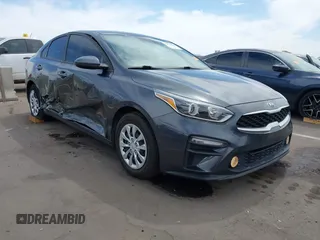 2021 Kia Forte LXS z VIN 3KPF24AD0ME300230, wystawiony jako IAAI lot #42373994 z przebiegiem 60 823 mil mil oraz . Historia ofert i sprzedaży dostępna na DreamBid. Obrazek 1.