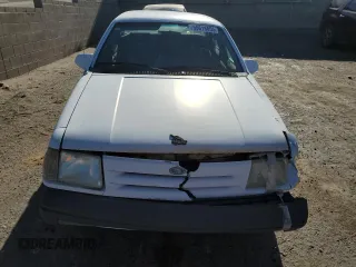 1986 Ford Tempo z VIN 1FABP22X4GK263512, wystawiony jako Copart lot #50618855 z przebiegiem 392 265 mil mil oraz Tytuł czysty. Historia ofert i sprzedaży dostępna na DreamBid. Obrazek 5.