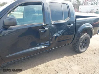 2009 Nissan Frontier SE with VIN 1N6AD07U89C405310, listed as a IAAI auction lot 41920771 with 271,894 mi miles. Bid and sale history available at carsss.com. Image 6.
