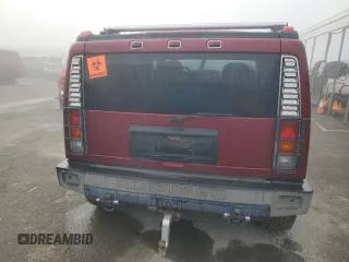 2003 Hummer H2 with VIN 5GRGN23UX3H147490, listed as a Copart auction lot 82876424 with 241,737 mi miles and Clean Title. Bid and sale history available at carsss.com. Image 6.
