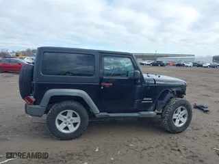 2011 Jeep Wrangler Sport with VIN 1J4AA2D1XBL634783, listed as a IAAI auction lot 41928702 with 154,379 mi miles. Bid and sale history available at carsss.com. Image 13.