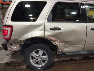 2011 Ford Escape XLT with VIN 1FMCU0D75BKB11168, listed as a IAAI auction lot 41327470 with 136,610 mi miles. Bid and sale history available at carsss.com. Image 6.