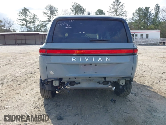 2024 Rivian R1S Adventure with VIN 7PDSGBBA1RN040036, listed as a IAAI auction lot 41694635 with 13,855 mi miles. Bid and sale history available at carsss.com. Image 6.