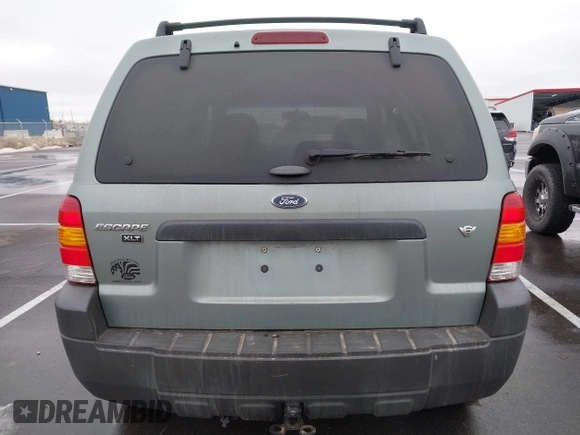 2006 Ford Escape XLT with VIN 1FMYU03126KC55897, listed as a IAAI auction lot 41733243 with 136,989 mi miles. Bid and sale history available at carsss.com. Image 16.