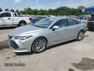 2020 Toyota Avalon Hybrid XLE z VIN 4T1J21FB0LU018424, wystawiony jako Copart lot #55163995 z przebiegiem 49 399 mil mil oraz Czysty tytuł • Clean title. Historia ofert i sprzedaży dostępna na DreamBid. Obrazek 1.
